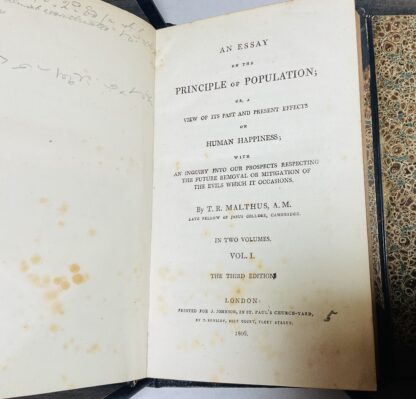 An Essay on the Principles of Population; or, a View of its Past and Present Effects on Human Happiness; With an Inquiry Into Our Prospects Respecting the Future Removal or Mitigation of the Evils Which it Occasions : With  [William Hazlitt] Reply to the Essay on Population by the Rev. T.R. Malthus, In a series of letters. To which are added, Extracts from the Essay; with notes. [Three Volume set in a custom clamshell box] - Image 4